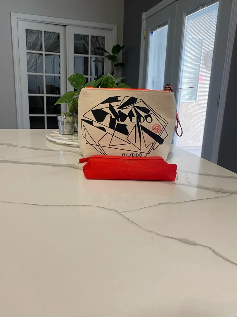 Shiseido Black & Cream Canvas Cosmetic Pouch with Red Travel Case